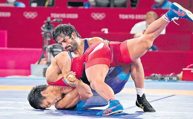 Tokyo Olympics: Bajrang Punia clinches bronze medal in mens 65 kg wrestling - Sakshi