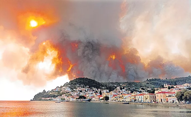 Greece Wildfires Spread Causing Mass Evacuations - Sakshi