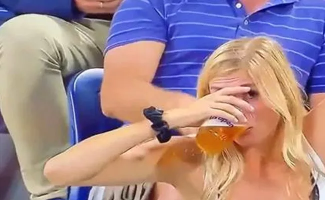 Viral Video: Woman Chugs Two Beers After Coming On Big Screen At US Open - Sakshi