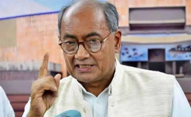 Digvijaya Singh draws analogy between RSS, Talibans - Sakshi