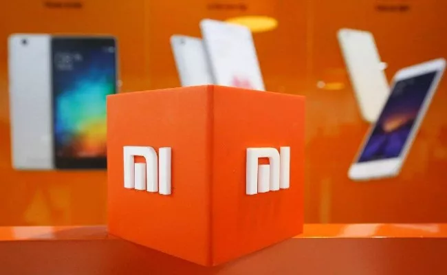 Xiaomi Drops Mi logo on premium products in India - Sakshi