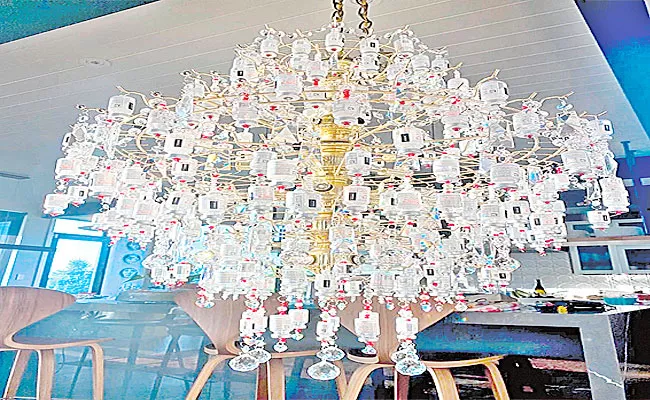 Lara Wies From Colorado Makes chandelier From Covid Vaccine Bottles - Sakshi