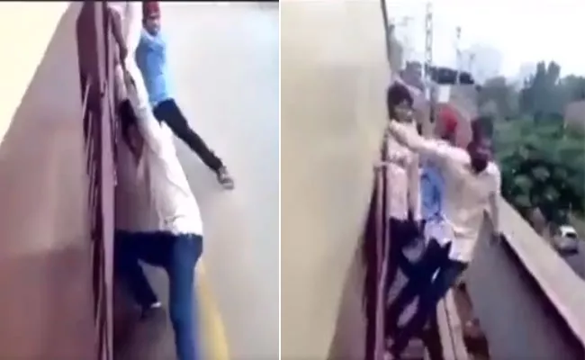 Boy Attempts Dangerous Stunts on Moving Train, Video Will Shock You - Sakshi