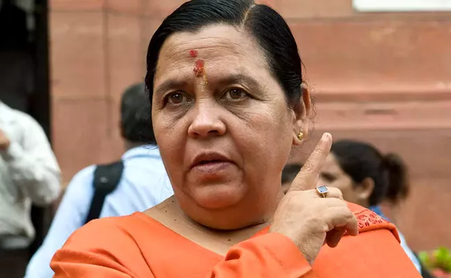 BJP Ex MP Uma Bharti Said Bureaucrats There To Pick Up Your Slippers - Sakshi