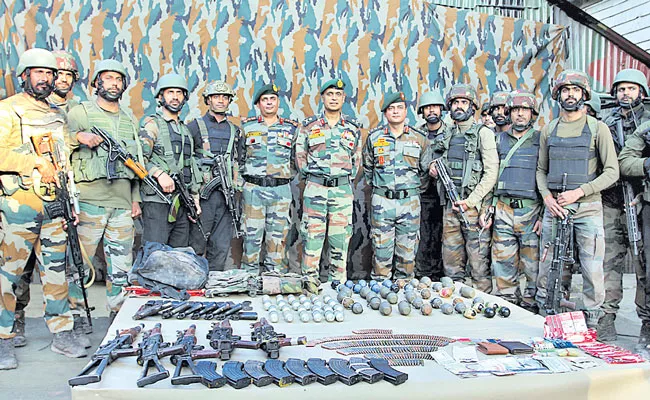 Three heavily armed terrorist killed near LoC in Uri - Sakshi