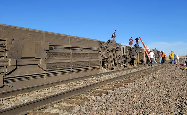 Three killed, several injured As Amtrak train In US  - Sakshi