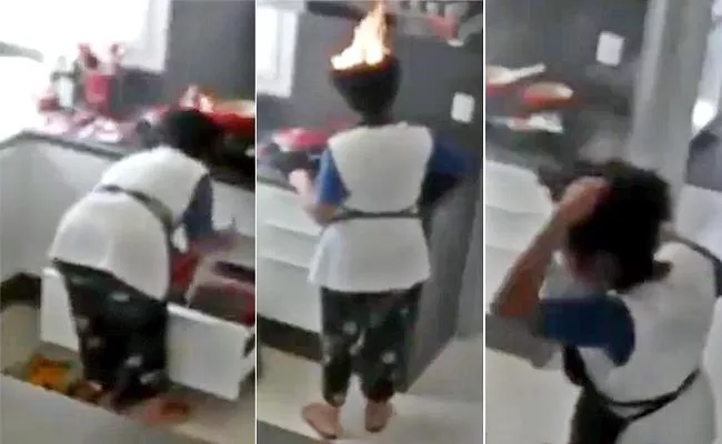 Viral Video Of Woman Hair Catches Fire While Working In Kitchen  - Sakshi