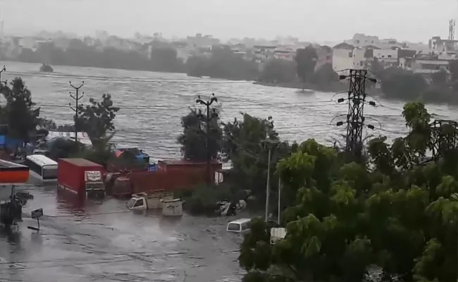 Dead Body Washed Away In Rain Floods At Amberpet - Sakshi