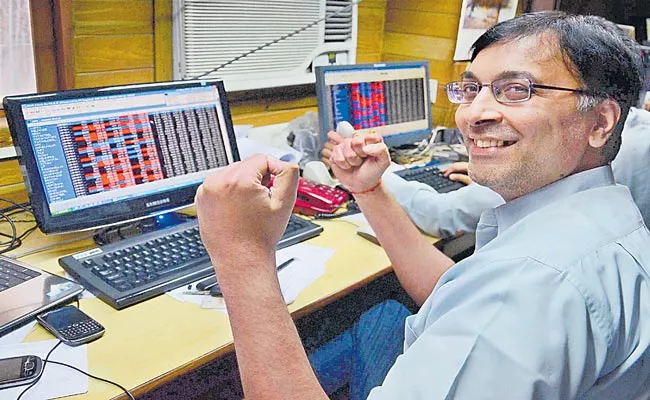 Sensex soars 663 points at close, Nifty rallies for 7th day to top 17,100 - Sakshi