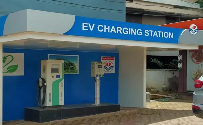 Ap Govt Setup Charging Of Electric Vehicles In Petrol Bunks - Sakshi