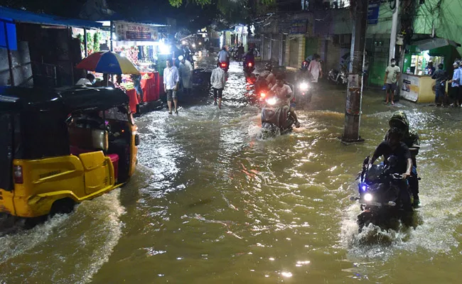 Two Hour Rain Inundates Several Areas Of Hyderabad City - Sakshi