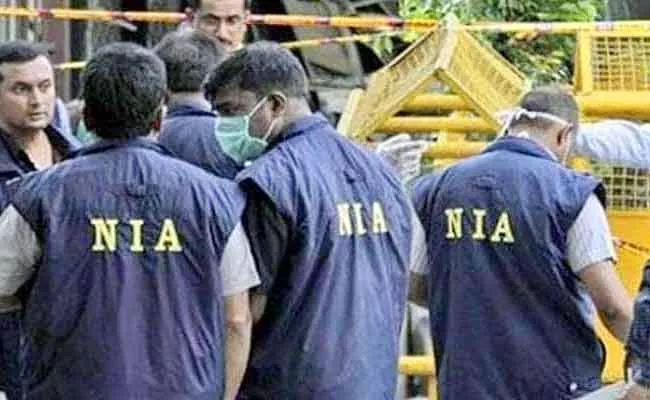 NIA Raids Various Locations In Jammu Kashmir Over ISIS And TRF - Sakshi