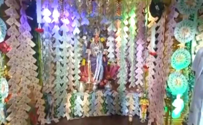 Vasavi Kanyaka Parameswari Devi Adorned With Rs 1 Crore Notes Bhimavaram  - Sakshi