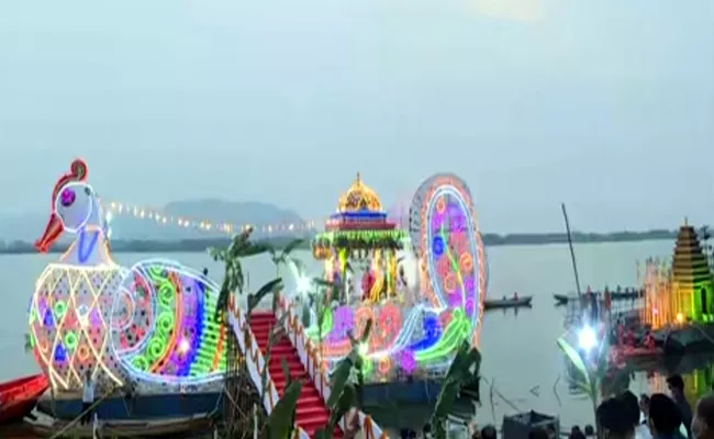 Sri Durga Malleswara Swamy Teppotsavam In Krishna River - Sakshi