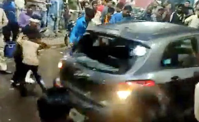 Car Rammed On People Durga idol Immersion Procession In Bhopal - Sakshi