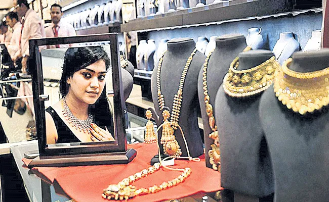 April-September gold Imports 24 billion dollers - Sakshi