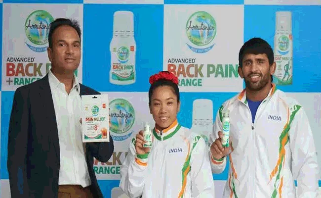 Mirabai Chanu and Bajrang Punia to endorse Amrutanjan - Sakshi