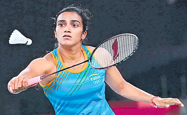 PV Sindhu enters quarter-finals after hard-fought win - Sakshi