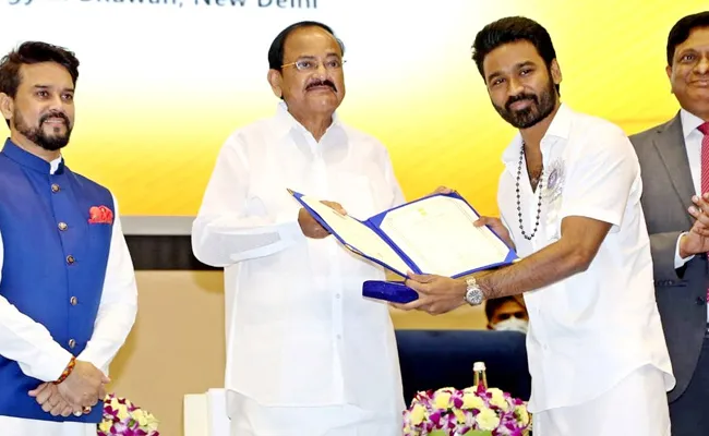 Dhanush Feeling Happy For Winning National Award On Same Stage Where Rajinikanth Received Dadasaheb Phalke Award - Sakshi