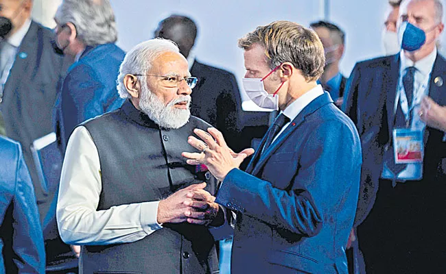 PM Narendra Modi Meets French President Macron on Sidelines of G20 Summit - Sakshi