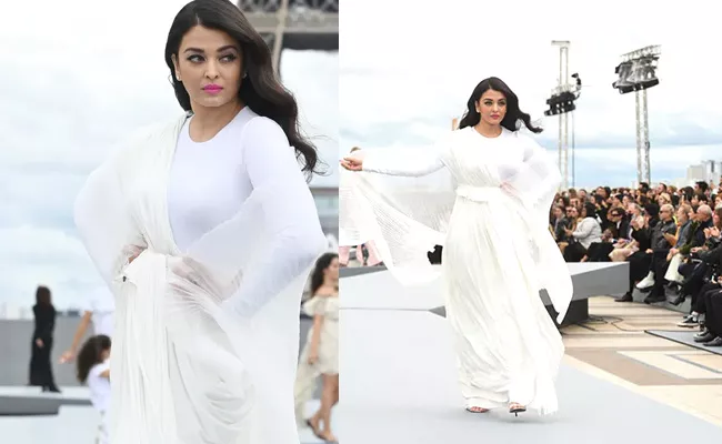  Paris Fashion Week: Aishwarya Rai Bachchan stuns in white outfit - Sakshi