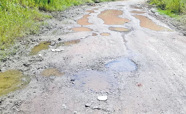 Roads Damaged In Telangana Due To Heavy Rains - Sakshi