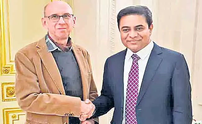 IT Minister KTR Meets French Professor Proficient in Telugu At Paris - Sakshi