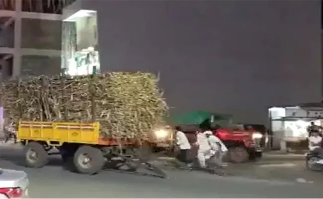 Unhooked Tractor Trolley Rolls Back On Street Crashes Onto Electrical Pole And Turns Light  - Sakshi