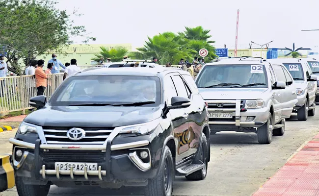 Woman running along with CM YS Jagan convoy - Sakshi