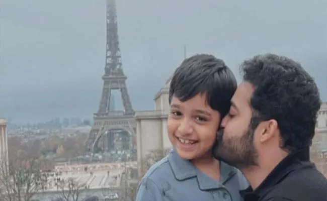 Jr NTR shares Cute Moment With Son Abhay Ram In Front of Eiffel Tower - Sakshi