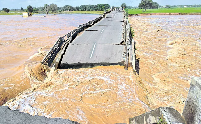 Roads Damaged Due To Heavy Rains In AP - Sakshi