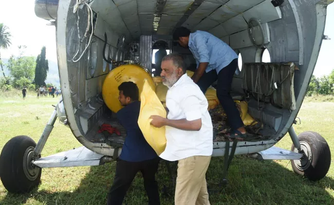 MLA Chevireddy Bhaskar Reddy Distributes Food With Help of Helicopter - Sakshi