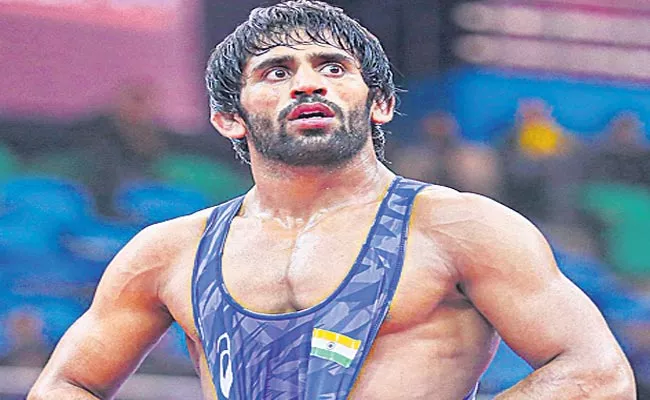 Bajrang Punia May Tie Up With Andriy Stadnik Ahead Paris Olympics - Sakshi