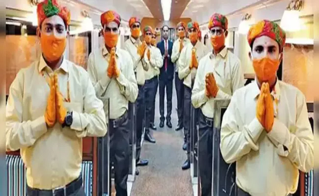 Railways withdraws dress code for waiters on board Ramayan express - Sakshi