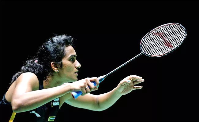 PV Sindhu Enters Quarterfinals Straight-Games Win Against Yvonne Li - Sakshi