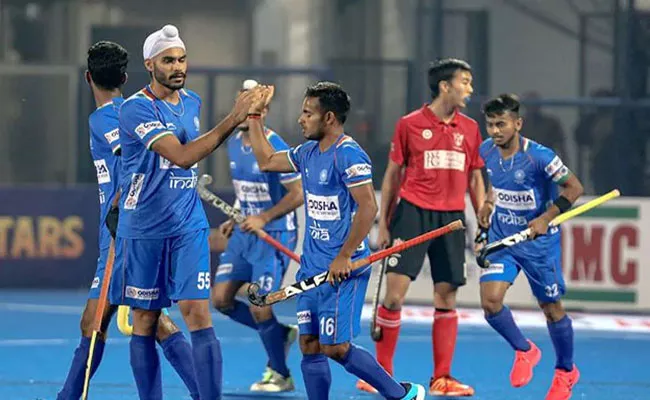 India crush Canada 13-1 to register first win - Sakshi