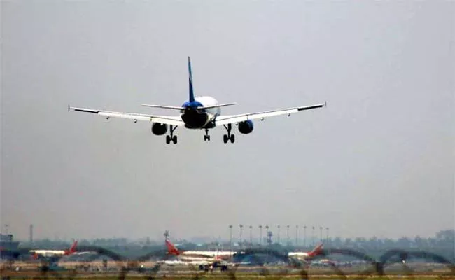 India to resume scheduled international flights from Dec 15 - Sakshi