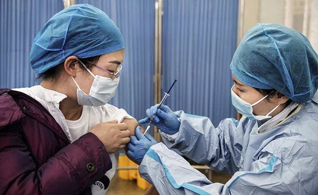 Colossal Outbreak: In China May Record Daily 630,000 Coronavirus Cases - Sakshi