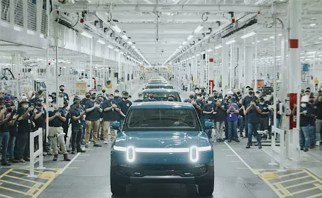 Rivian Valued 100 Billion Dollars In Debut After World Biggest Ipo Of 2021 - Sakshi