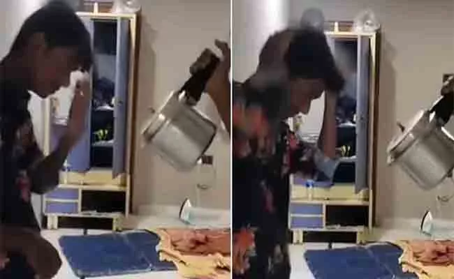 Boy Use Pressure Cooker As Hair Dryer Video Goes Viral - Sakshi