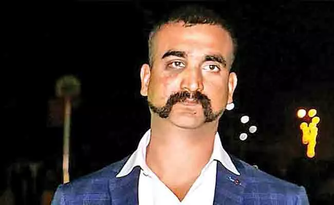 IAF promotes Balakot air strike hero Abhinandan to Group Captain rank - Sakshi