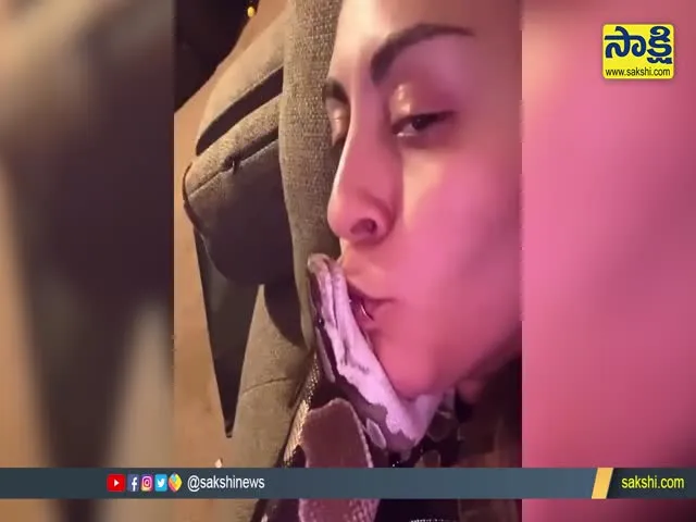 Girl Kisses Her Pet Snake Video Gone Viral In Social Media