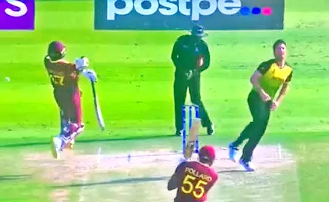 T20 World Cup 2021: Dwayne Bravo Fall After Pollard Shot Hits Him Viral - Sakshi