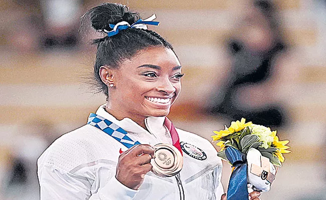 Simone Biles Named TIME magazine 2021 Athlete Of The Year - Sakshi