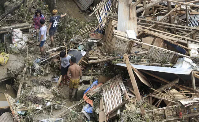 Super Typhoon Rai Hits Philippines 21 People Died - Sakshi