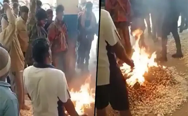 Viral Video Farmer Sets 160 kg Garlic Produce Ablaze - Sakshi