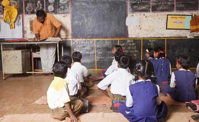 Principal Cuts Students Hair At Maharashtra   - Sakshi