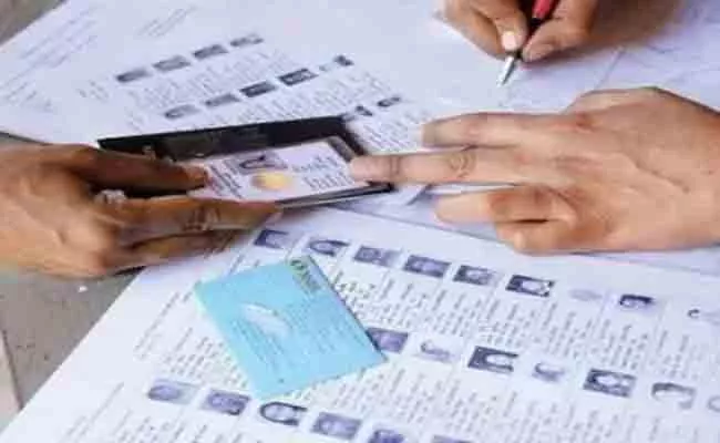 Electoral Reform bill to link Aadhaar, Voter ID gets Rajya Sabha Approval - Sakshi