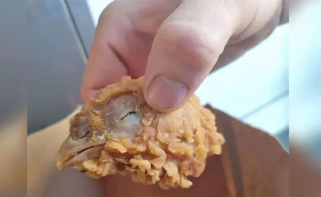 UK Customer Finds Partially Fried Chicken Head Inside Of KFC Box Know Company Reaction - Sakshi