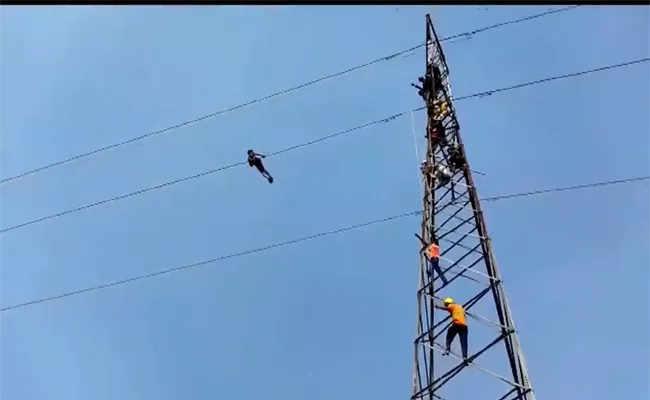 Mentally Unstable Man Climbs A Top Electricity Tower At Bihar - Sakshi